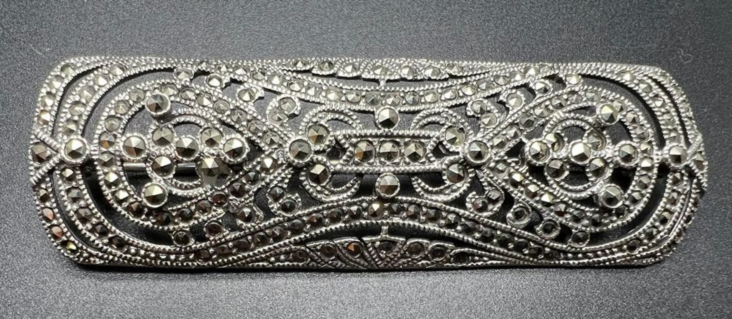 Broche plata y marcasitas