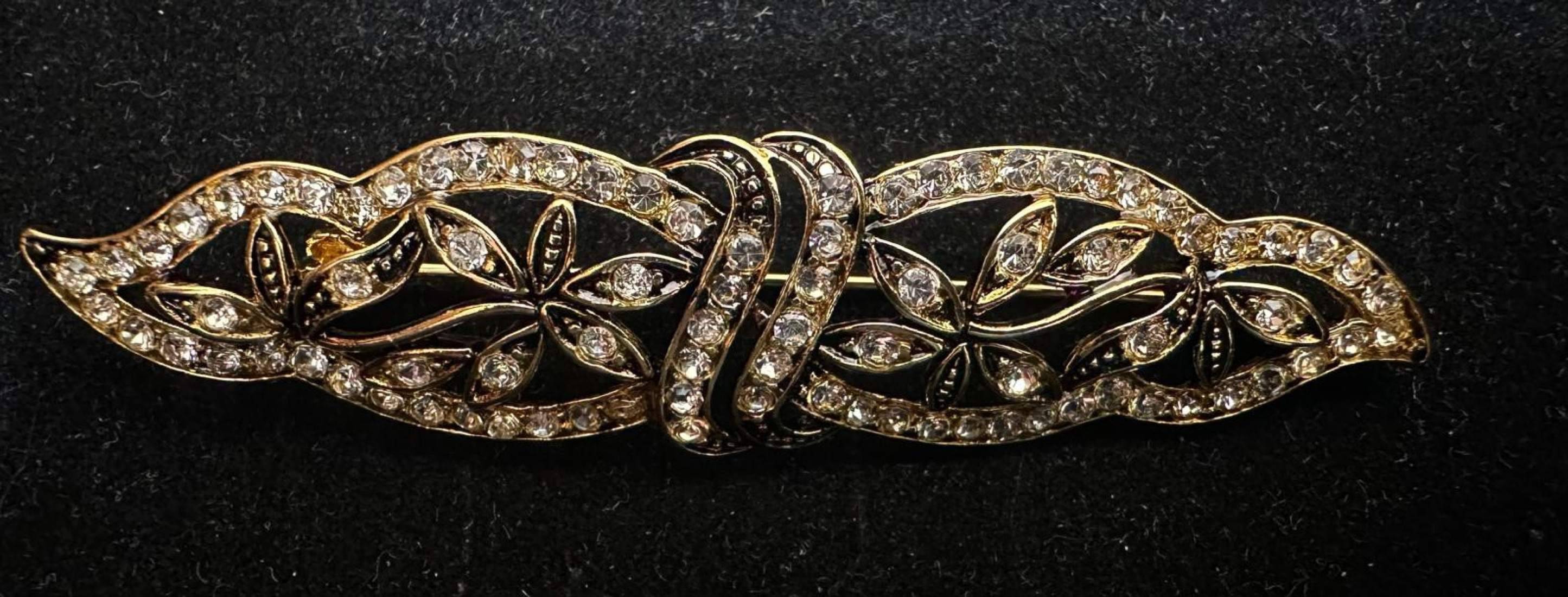 Broche mantilla rodio