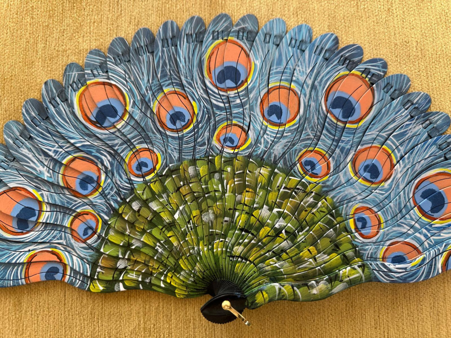 Abanico baraja pavo real