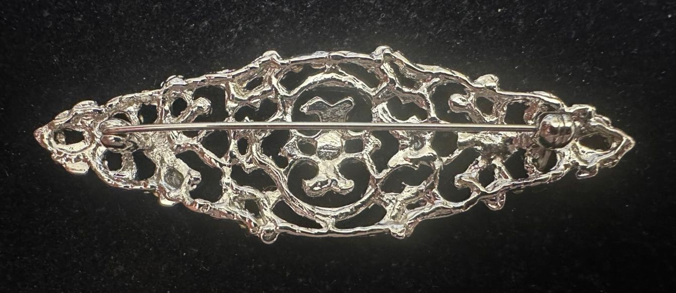 Broche mantilla rodio