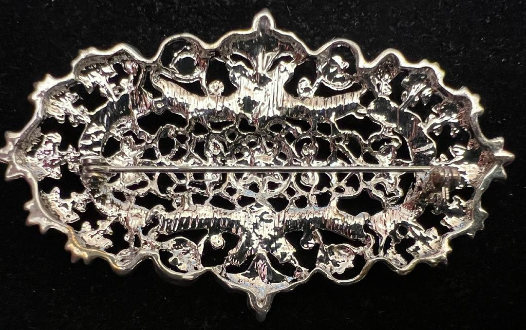 Broche mantilla rodio