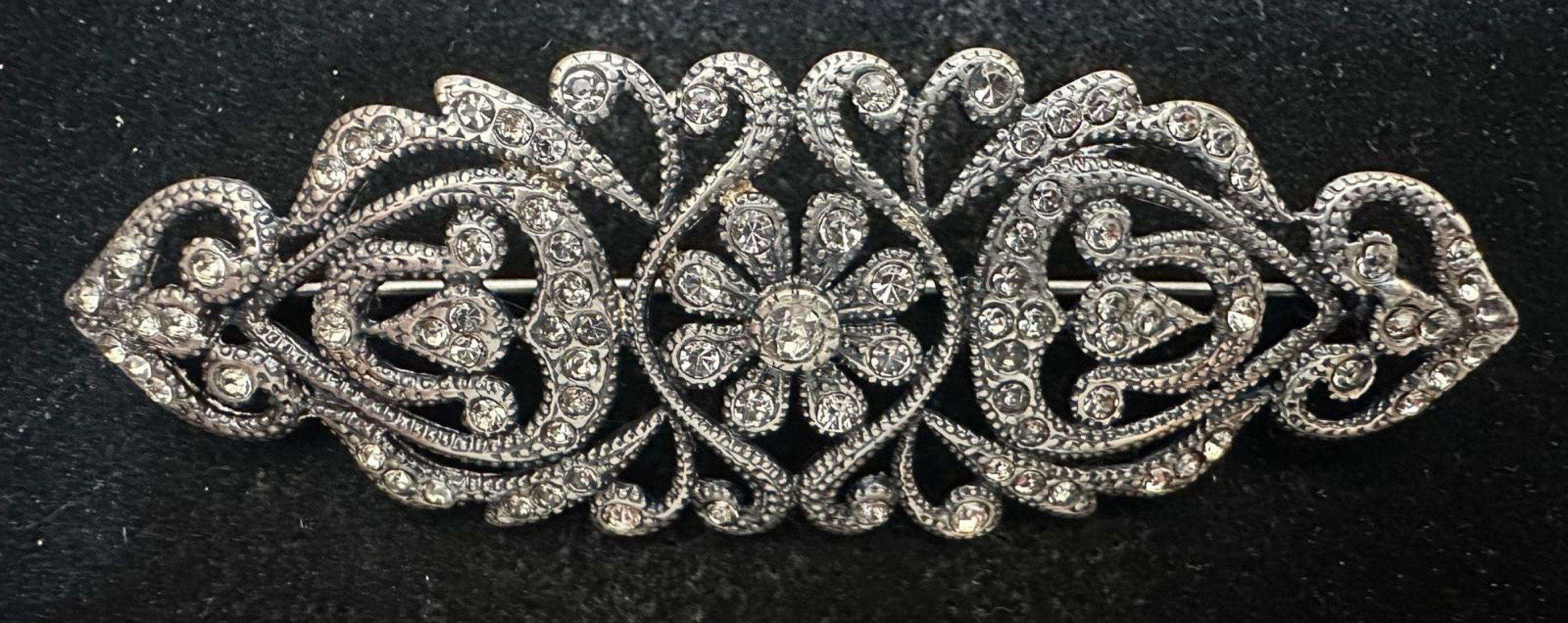 Broche mantilla rodio