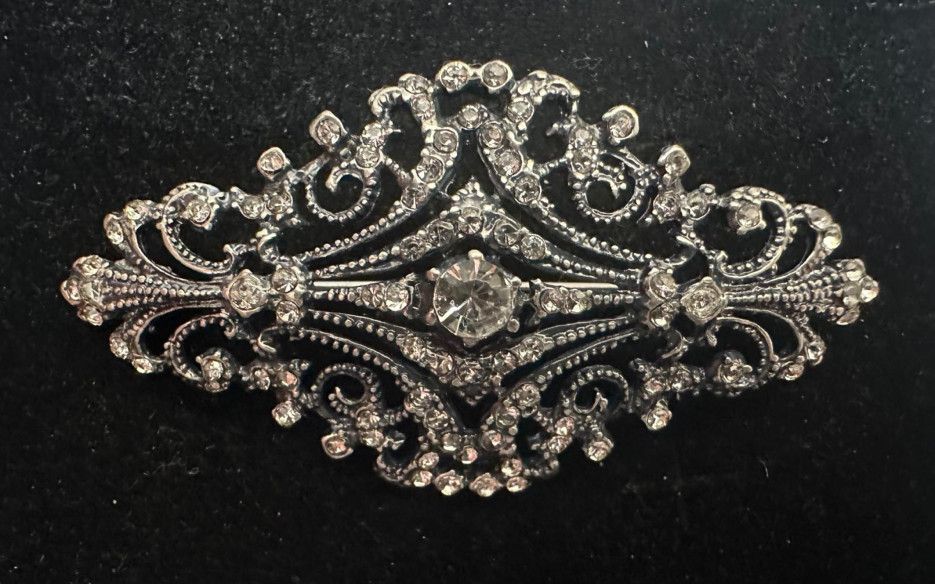 Broche mantilla rodio