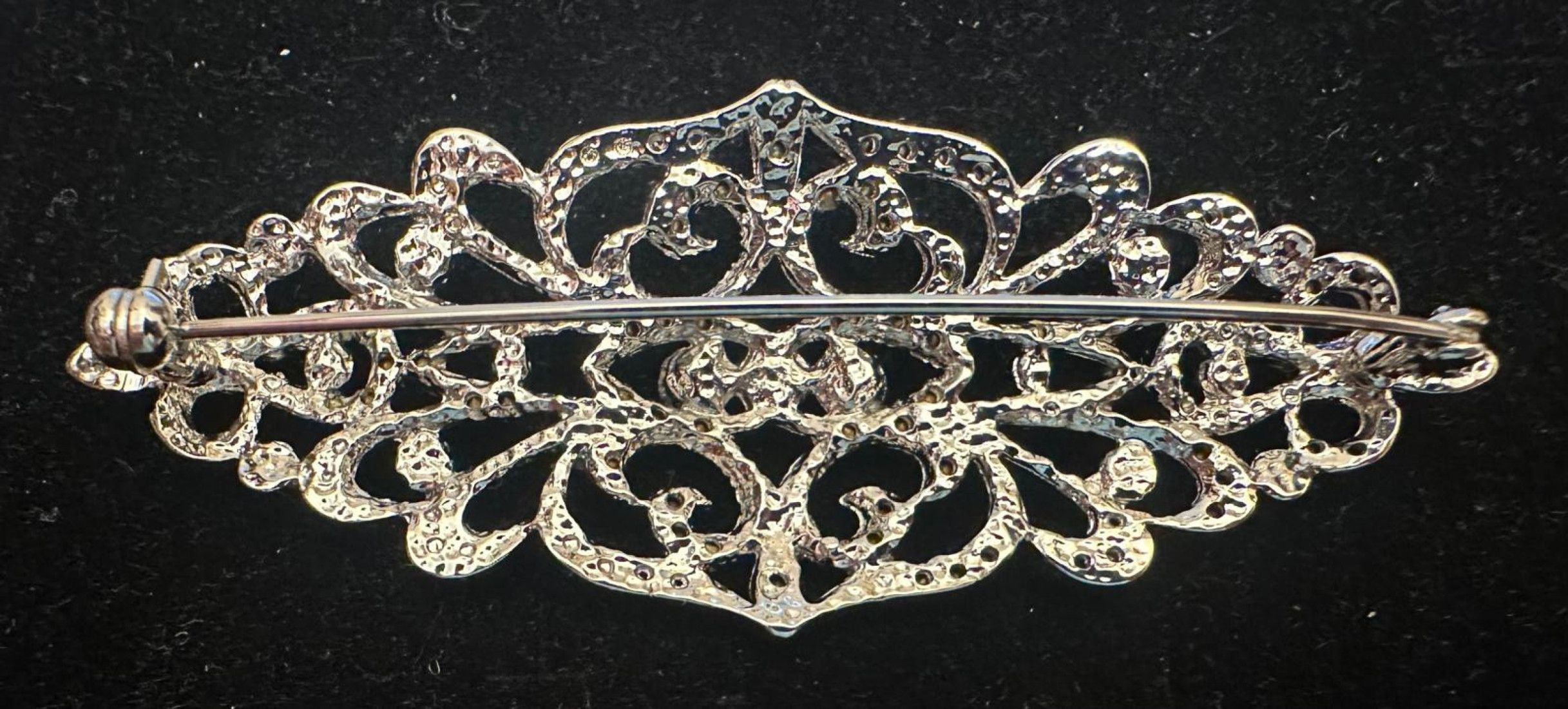 Broche mantilla rodio