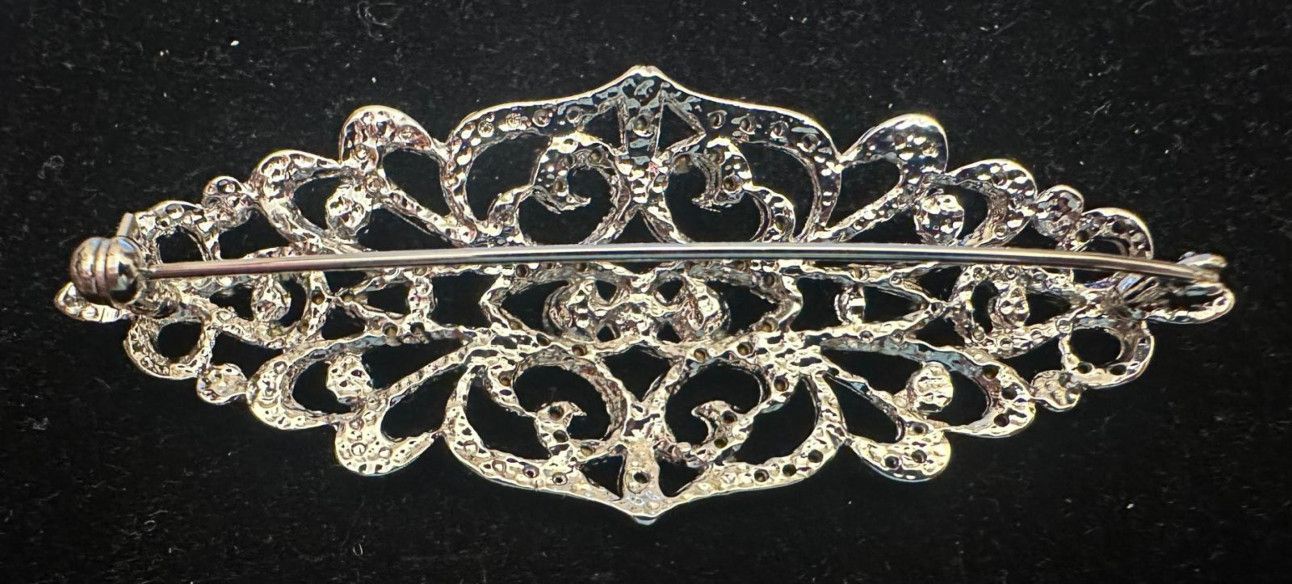 Broche mantilla rodio