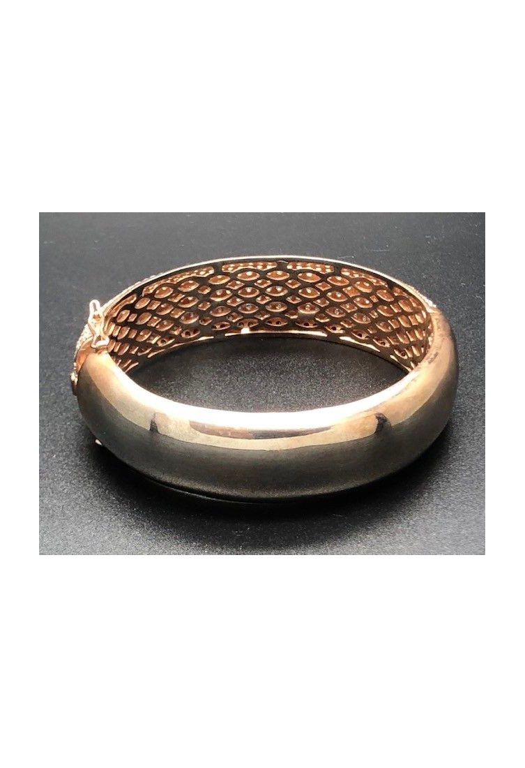 Pulsera rígida color cobrizo circonitas