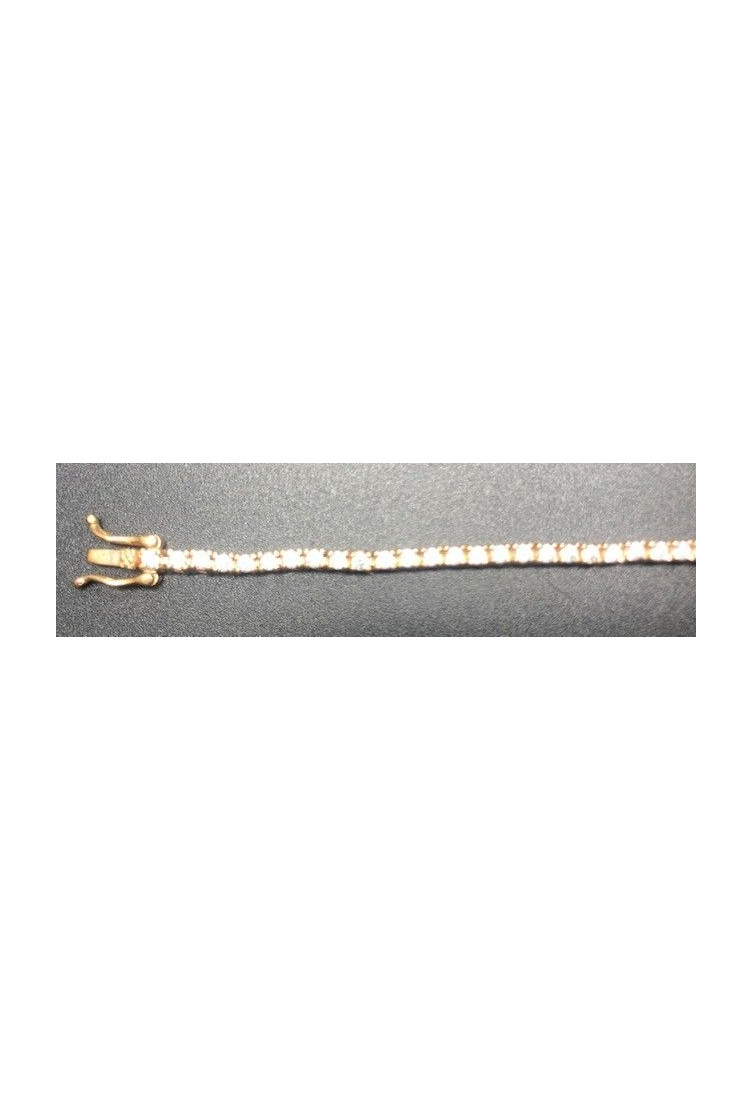 Pulsera fina dorada con circonitas redondas
