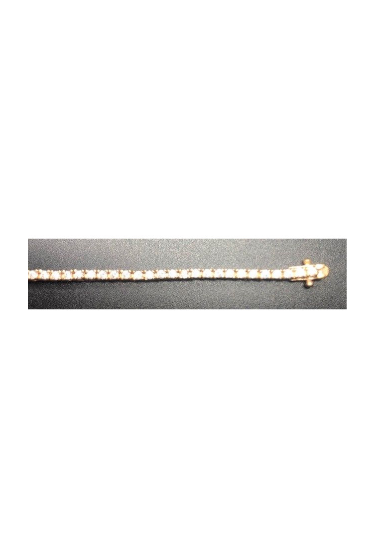 Pulsera fina dorada con circonitas redondas