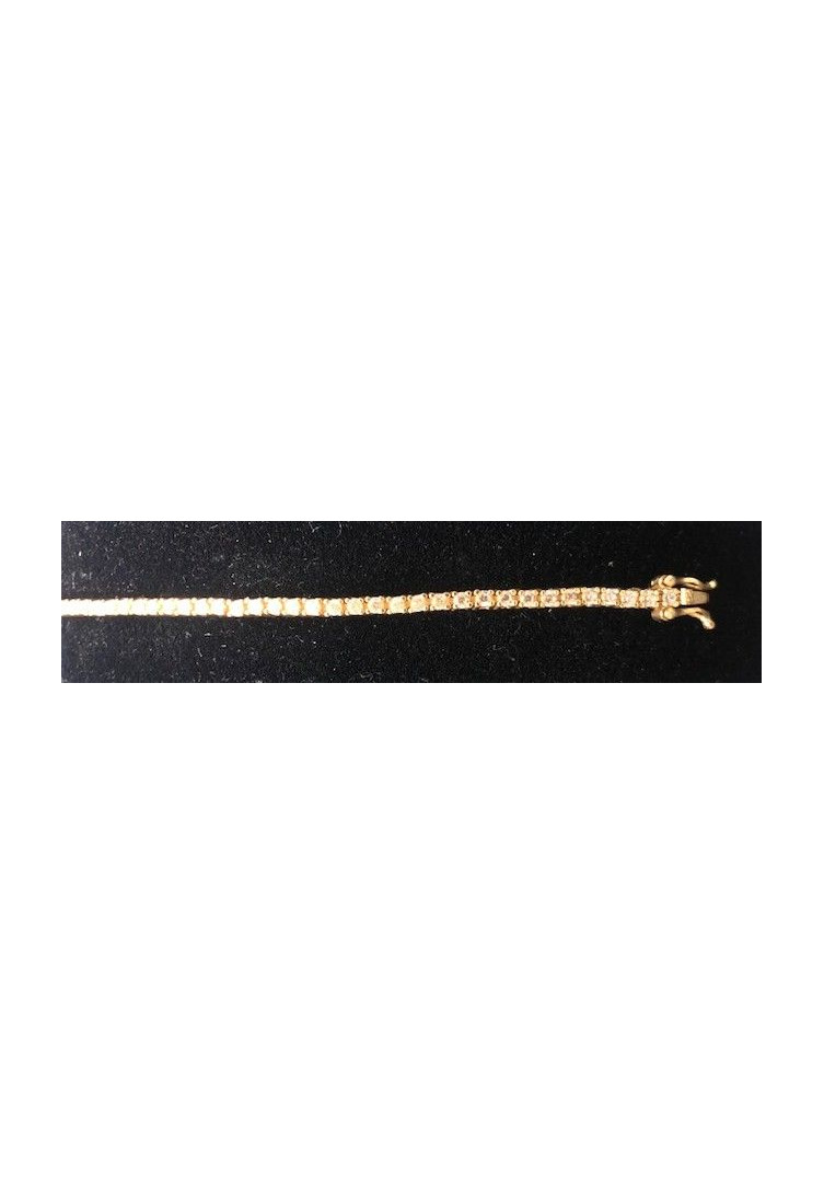Pulsera fina dorada con circonitas redondas